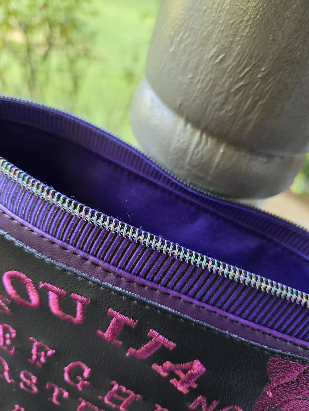 Asylum Handicrafts compact wristlet